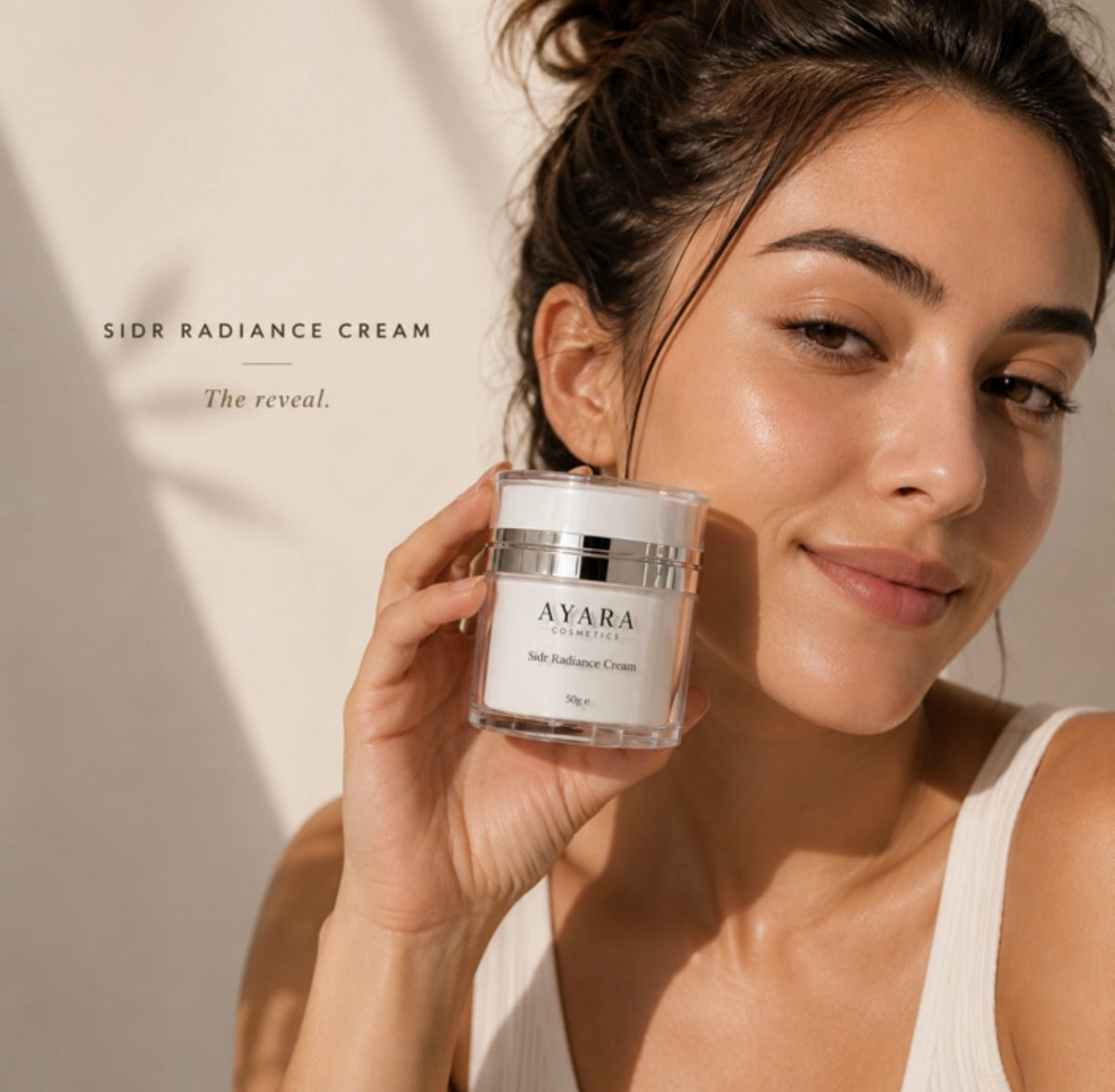 Model holding AYARA COSMETICS Sidr Radiance Cream
